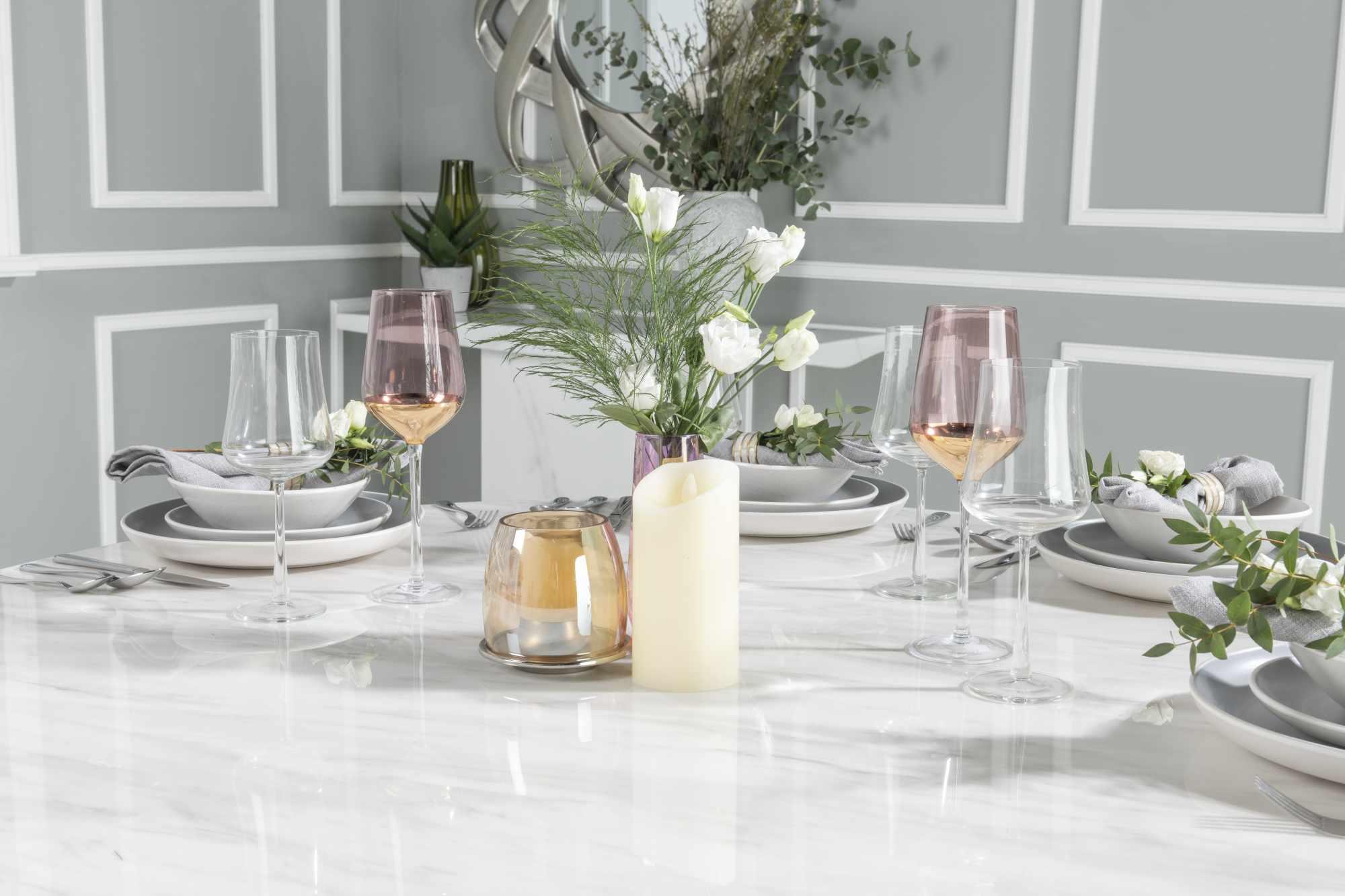 Product photograph of Carrera 130cm White Marble Round Dining Table from Choice Furniture Superstore.